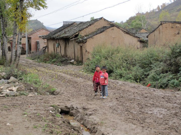 Houses are mainly built with brick and strengthened with dried cow dung.