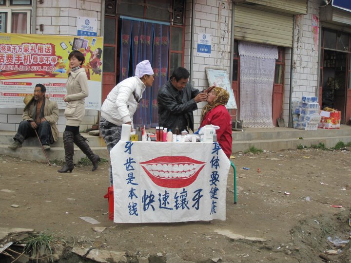 A pop-up dental service kiosk in the weekly market.